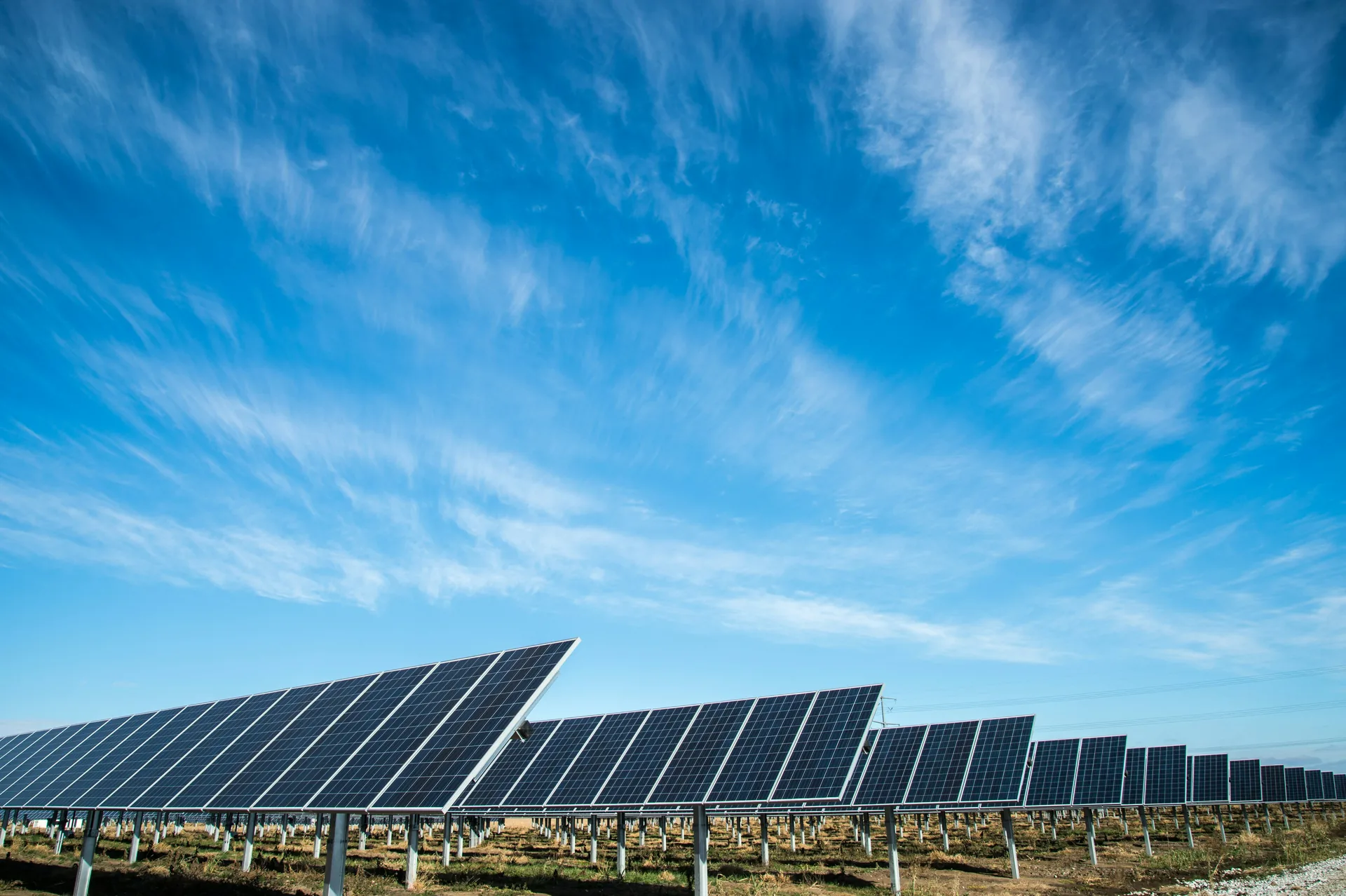 Illustrative solar panels beneath an open sky in Lincoln, USA.