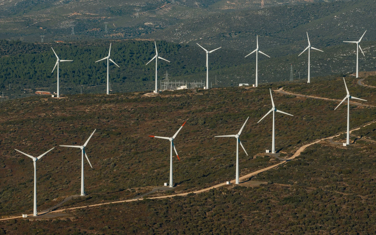Wind turbines along a ridgeline.
